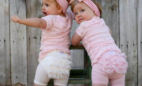 frilly and fancy baby clothes