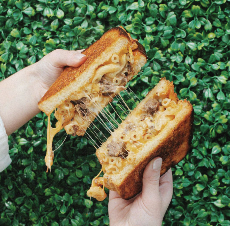 A baked mac and cheese sandwich with slow-cooked short rib from I Heart Mac & Cheese.