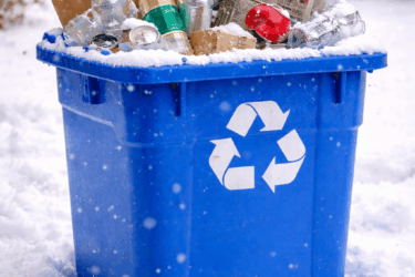Recycling Bin full of items in the snow for recycled holiday crafts